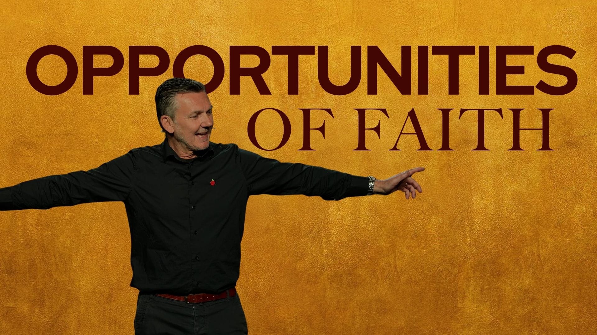 A man with short, styled grey hair and a black collared shirt stands with his arms outstretched, gesturing to his right. He is smiling and looking in the direction he is pointing. Behind him is a textured gold background with the words "OPPORTUNITIES OF FAITH" in dark red capital letters.